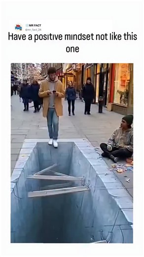 ❄️MR FACT on Instagram: "The post shares a 58-second video compilation of 3D chalk street art illusions on sidewalks, depicting deceptive pits and lava flows that elicit panicked jumps and falls from unaware pedestrians, captioned to promote a positive mindset over fearful reactions. High engagement (over 4 million views, 7,000 likes) reveals divided opinions: many praise the clever optical illusions as inspirational, while skeptics label it citing inconsistent ground textures, though similar re