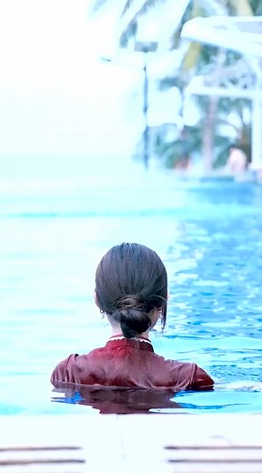 Stunning Poolside Fashion in Dark Red Dress