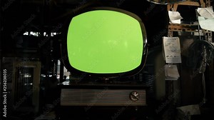 Old Round TV With Green Screen In An Antique Store.