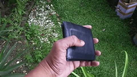 clip-3984527557-asian-man-open-empty-wallet-businessman-showing