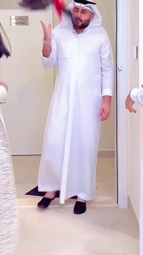 Funny Home Prank with White Robe and Checkered Scarf