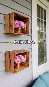 Who knew IKEA crates could look this cute hanging outside? I grabbed a couple wooden crates from my local IKEA, gave them a little stain (I used the colour "Provincial"), added eye hooks and picture wire, and used siding hooks to hang them right on our house. Boom: easy outdoor shelves! I tucked some mugs of flowers inside for instant cottage vibes. Thinking of trying this IKEA hack? Comment “outdoor shelf” and I’ll send you the DIY steps! #outdoordecor #ikeahack #dollardiy #thediymommy #cozydiy