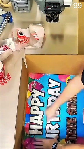 Cardboard box sealed with red-white tape dispenser