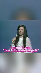 "Ten Thousand Angels" is a song by Loretta Lynn, The song speaks of seeking divine intervention and strength during difficult times. #LorettaLynn #TenThousandAngels #CountryMusic #ClassicCountry #FaithAndResilience #HeartfeltSongs #MusicLegends #CountryClassics #EmotiveVocals | Michael Almuete Bernardo