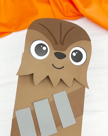 5K views · 20 reactions | Create your own Chewbacca puppet with this fun paper bag craft!  https://www.simpleeverydaymom.com/chewbacca-paper-bag-puppet/ #ChewbaccaCraft #PaperBagPuppet #CraftForKids #DIYCrafts #CraftyFun #KidsActivities #PreschoolCrafts #ElementaryCrafts #easycraftsidea | Simple Everyday Mom | Facebook