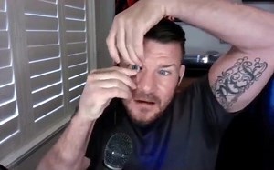 9.9K views · 112 reactions | Michael Bisping removes false eye during podcast (sound removed) | MYMMANEWS.com - YOUR #1 Mixed Martial Arts News Site | Facebook