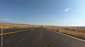 Smooth Time-Lapse Drive Through Deserted Utah Road During the Day