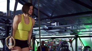 Download Woman does dips on the rings for free