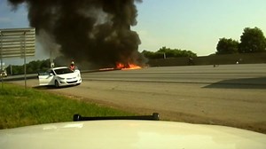 Police video shows moment plane crashes on interstate