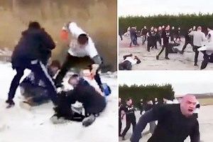 Shocking moment two sets of football hooligans square off in a brutal mass brawl