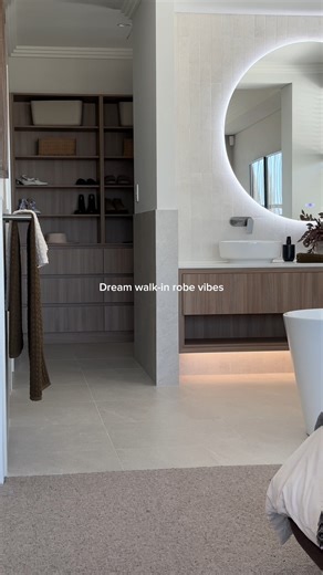This master walk-in robe is what dreams are made of 🙌 Tiled floors, warm Laminex Australia Danish Walnut cabinetry, and the perfect flow from bedroom to ensuite and walk-in robe. Simple, functional, beautiful. Come see it for youself in our Balcatta display home. Open this weekend! 🏡 | 101 Residential