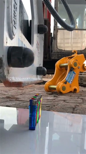 Skilled heavy equipment operator lights a lighter with precision #shorts #machinery #skills