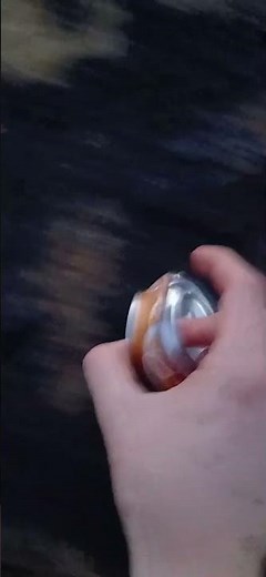 Sliding crushed can across a rock sound effect