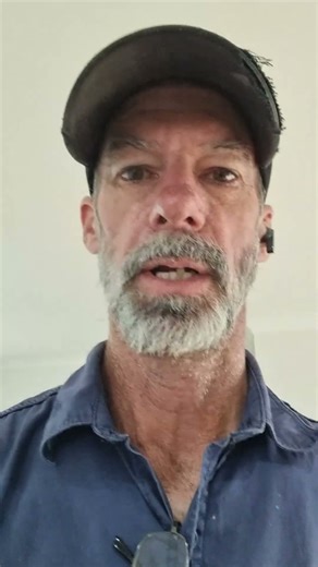 Reinstalling Kitchen panels after they have been painted.