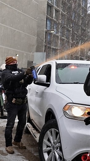 Federal agents used pepper spray to push through an angry crowd that blocked their vehicles as they checked identifications in a heavily Somali neighborhood of Minneapolis on Tuesday, amid the Trump administration's ongoing crackdown targeting the community. | AP
