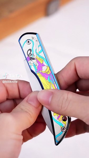 Wharncliffe blade is made of ZDP-189 San Mai steel, sharp and durable. Anodized titanium handle is decorated with charming 3D colorful carvings, inspired by the flying fairies and nine-colored deer in Dunhuang murals. Use it to enrich your pocket equipment. #edc #edcgear #handcraft #edcknife #folder #knife
