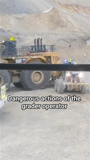 The rear wheel of loader hit the grader beside it #dangerous #operator #heavyvehicle