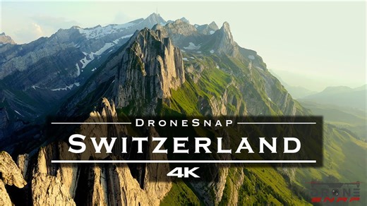 Switzerland breathtaking 4K drone aerial over Alps, lakes and villages