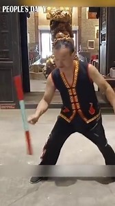 A Chinese folk artist shows fantastic skills in manipulating the "devil stick," an intangible cultural heritage in many parts of the country. | Beautiful China