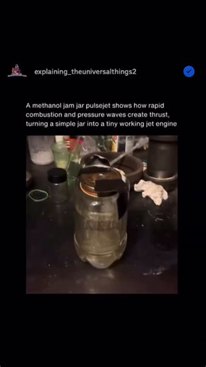 Explaining_the_universalthings on Instagram: "A jam jar pulsejet engine is a simple yet fascinating demonstration of reactive propulsion. It works by igniting a fuel-air mixture inside a jar, usually methanol vapor mixed with air, which rapidly combusts and expands. The expanding gases rush out of the opening, creating thrust, while the sudden drop in pressure draws fresh air and fuel back in to repeat the cycle. This repeating cycle of ignition and refill happens many times per second, producin