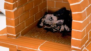 Slime Sam is an awesome brick layer! Otherwise, why would he need a whole box of real mini bricks? But he needs some help from his friend Sue to make a mini oven to bake a mini pizza. This mini oven is made just like a real one, with bricks held together by mortar. It's important not to rush and lay each brick carefully. Follow Sue's example to form the walls of the oven. There's a section for wooden chips and a large section for pizza backing. The roof of this oven is rounded and looks pretty a