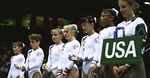 Strug helps 'Magnificent Seven' to gymnastics team gold