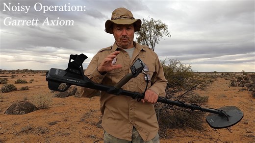 Out chasing gold and your detector won’t stop chattering? Warren from NQ Explorers reminds us of two simple steps to calm things down: - Ground Balance again - Frequency Scan to reduce interference A quiet machine helps you hear the faint gold signals most people miss. Dial it in, swing slow, and go get that gold!⛏️ #garrett #garrettmetaldetectors #GarrettAxiom #goldprospecting #axiom #goldnugget #goldtips #metaldetecting | Garrett Metal Detectors