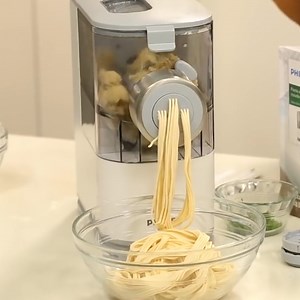 Prepare fresh pasta and noodles from scratch with this easy, compact pasta maker