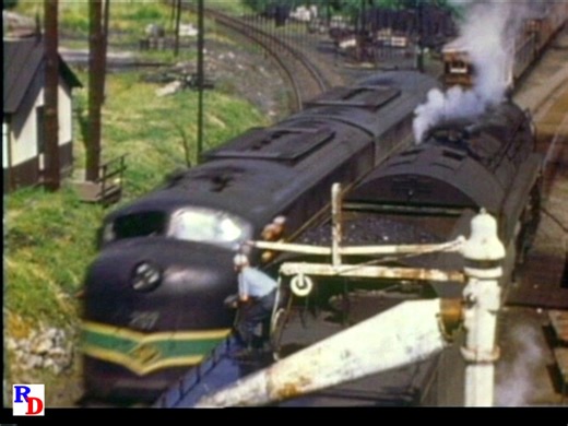 This is real steam railroading as a Reading T-1 locomotive rolls in at Lebanon Valley Junction (Pennsylvania) for water. A diesel powered freight passes and the 2124's Fireman has a good laugh! From the Herron Rail Video show "Reading Company, Volume 2" https://rfd.video/ReadingCo2 | Steam Giants