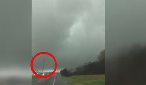 Tower toppled as massive Alabama tornado caught on video