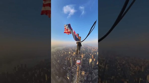 Renegade Climber Hangs Off The Top of The Empire State Building
