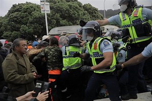 Arrests as police and protesters clash at parliament