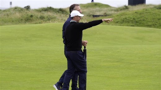 Rory McIlroy takes in Royal Portrush during The Open practice round