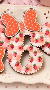 1.9M views · 7.8K reactions | My daughter's 6th birthday is coming up soon! This strawberry gingham royal icing design was inspired by the pattern on her favorite water bottle. I used the Disco Numbers 2 cookie cutter set from Cakes N Supplies by Ximena The instructions and recipes are in the Cookie Art Club! | SweetAmbs | Facebook