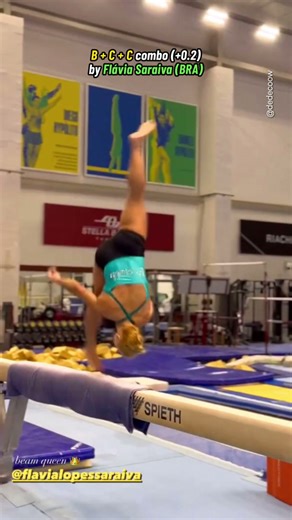 A world-class gymnast delivers an exceptional performance, completely owning her balance beam sequence