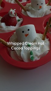 Hot cocoa season just got a major upgrade. ❄️❤️ Freeze these Santa hat toppers now, thank yourself all winter. #Food #HotCocoa #CozyDrink #Family #HotChocolate #Winter #Christmas | PureWow