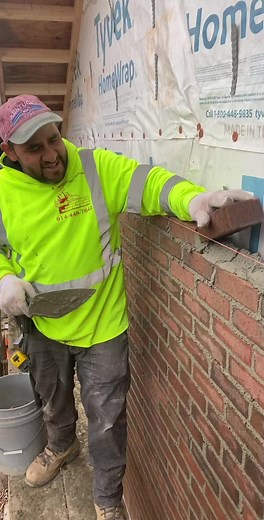 Expert Bricklaying Techniques on a Construction Site