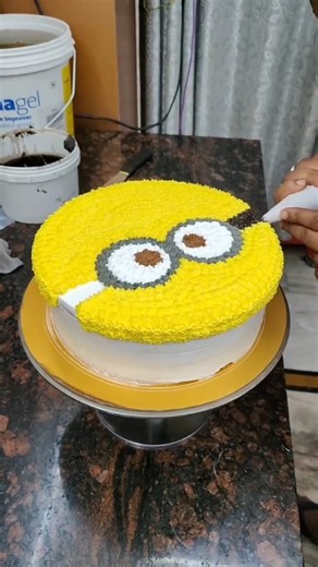 Sunil Mastar on Instagram: "Cute Minion Theme Cake Design #MinionCake #CartoonCake #KidsBirthdayCake #YellowBlueCake"
