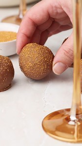 My rich and creamy Champagne Truffles are the ultimate celebratory confection. Containing just five ingredients, they are a chocolate lover’s dream! We add Champagne to a smooth and creamy dark chocolate ganache, roll it into balls, coat in yet more chocolate and finish with a light sprinkle of gold sugar. FULL RECIPE: https://itsnotcomplicatedrecipes.com/champagne-truffles/ | It’s Not Complicated Recipes | Facebook