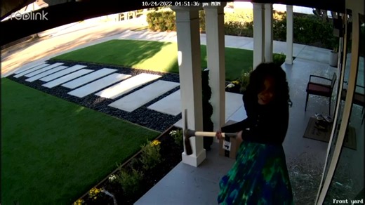 VIDEO: Woman with pickaxe smashes in windows of Pasadena home