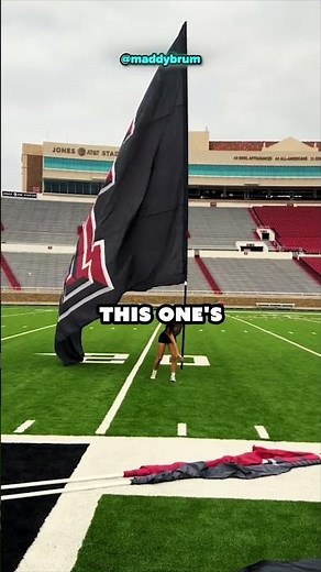 This Cheerleader’s 16-Foot Flag Takes Serious Strength!