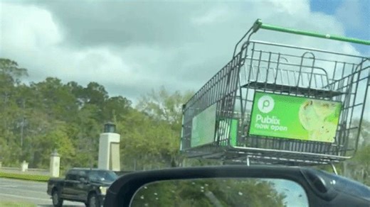 Bizarre moment huge motorized shopping cart makes U-turn on Florida parkway