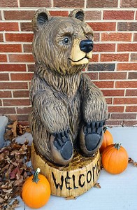 Finished painting this big guy this morning. Dimensions are 37 in tall and 16in wide at the base. #chainsawcarving #bear #welcome #cute | Mark Ballard