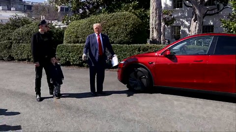President Donald Trump buys new Tesla alongside Elon Musk