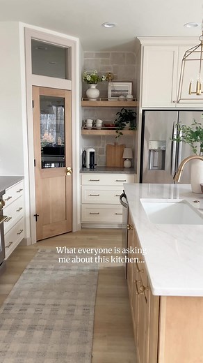 Tracy Baggett on Instagram: "SAVE or SHARE this post if you’ve been looking for the prettiest off white kitchen cabinet 😍 SW White Duck is the perfect color if you don’t want super white and can’t commit to a taupe! Comment KITCHEN below for a 🔗 to be sent straight to your inbox with all the sources and info on our kitchen! Kitchen design Kitchen decor Kitchen backsplash Stone backsplash Kitchen inspo Kitchen countertops"