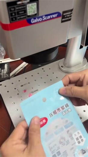 20W fiber laser marking machine marking batch number expire date on plastic bag.#lasermachine