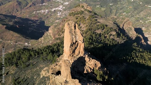 Aerial view of Roque Nublo a peak and monolith in Gran Canaria located in the center of the island, a mountain mass of volcanic origin, one of the most characteristic symbols of the island