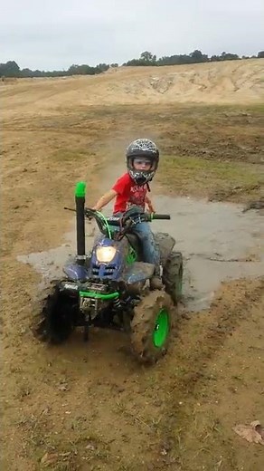 50cc four wheelers in mud