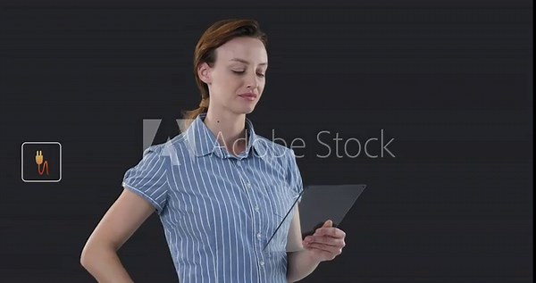Woman holding tablet, tapping and gesturing, spawning floating energy icons and scores for demo