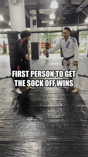 Guess who got to keep the pair of socks? 👀 #SockChallenge #BJJ #BJJSingapore #EvolveMMA | Evolve MMA